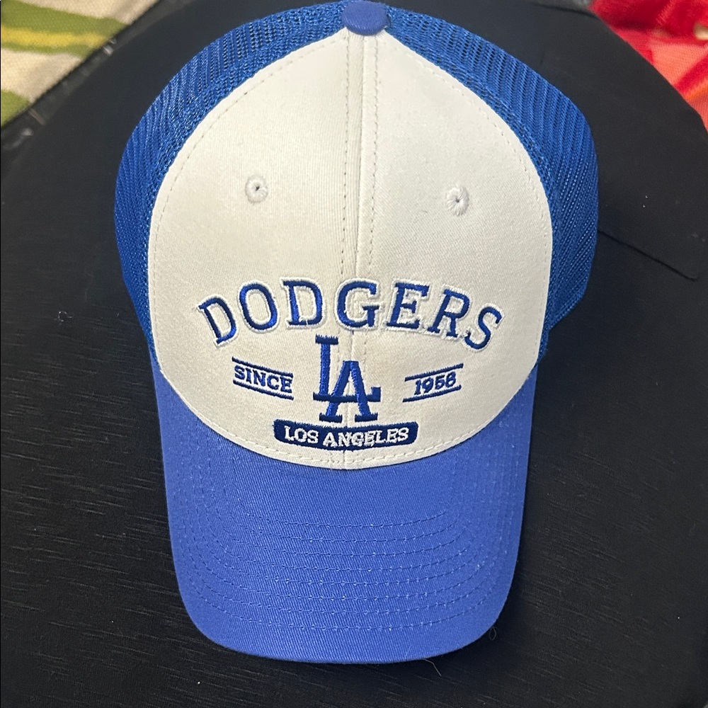 Genuine Merchandise Blue and White Cap